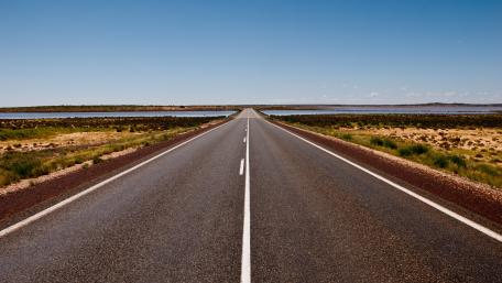 Endless Road Under a Clear Sky wallpaper