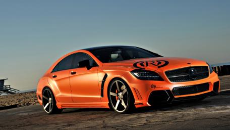 Sleek Orange Mercedes-Benz CLS for Enthusiasts wallpaper