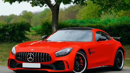 Vibrant Red Luxury Sports Car Wallpaper wallpaper
