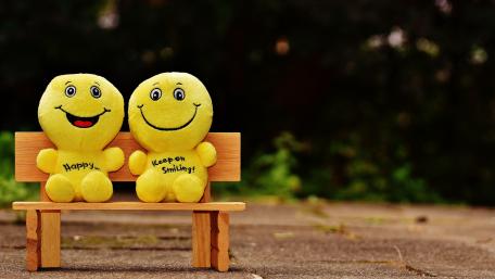 Title: Smile Bright and Cheerful Toy Companions wallpaper