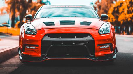 Fiery Red Nissan GT-R Dominance wallpaper