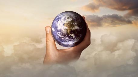 Holding the World in Hopeful Hands wallpaper