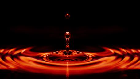 Red Liquid Symphony in Motion wallpaper