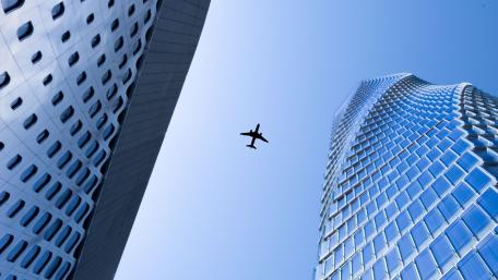 Skyward Dreams Above Urban Giants wallpaper