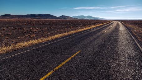 Open Road in Serene Landscape wallpaper