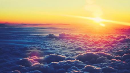 Dreamy Sunrise Above the Clouds wallpaper