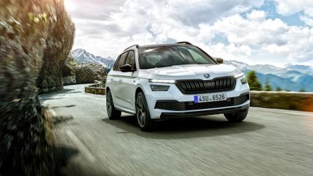 Sleek Skoda Kamiq on Scenic Mountain Road wallpaper
