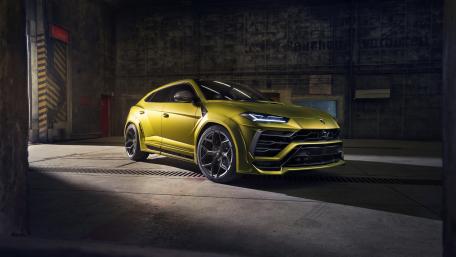 Lamborghini Urus in Bold Yellow Elegance wallpaper