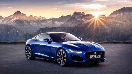 Sleek Jaguar F-TYPE in Majestic Mountain View wallpaper