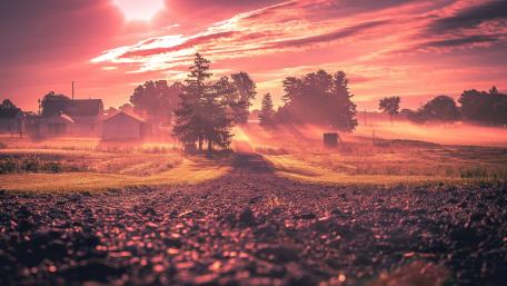 Crimson Twilight Over Tranquil Countryside wallpaper