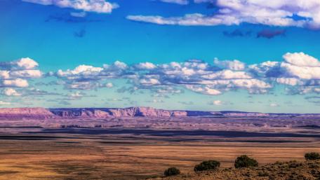 Vast Open Plains and Blue Skies wallpaper
