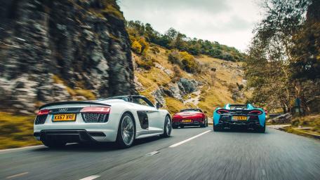 Supercars in Motion on Scenic Roads wallpaper