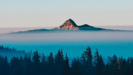 Mysterious Fog-Covered Peak in 4K Quality wallpaper