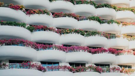 Charming Flowered Balconies in a Modern Building wallpaper