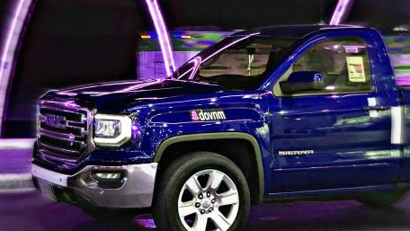 Gleaming GMC Pickup on Night City Drive wallpaper