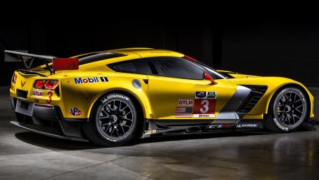 Bold Yellow Chevrolet Corvette Race Car Wallpaper wallpaper