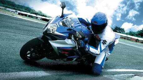 Thrilling Suzuki Racing Experience wallpaper