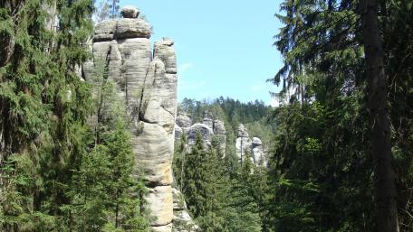 Majestic Rock Formations Amidst Lush Forests wallpaper