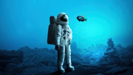 Astronaut’s Underwater Encounter wallpaper