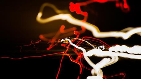 Dynamic Light Trails in Motion wallpaper