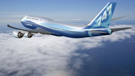 Boeing 747 in Flight Above the Clouds wallpaper