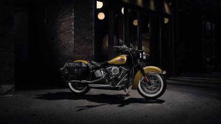 Classic Harley-Davidson Softail in Dark Urban Setting wallpaper