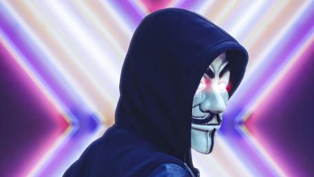 Neon Masked Vigilante in the Shadows wallpaper
