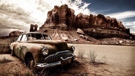 Ancient Wheels in the Desert Dust wallpaper