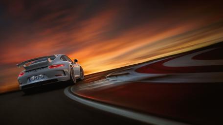 Blazing Speed on Sunset Horizon wallpaper