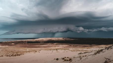 Majestic Desert Storm Captured in 5K Resolution wallpaper