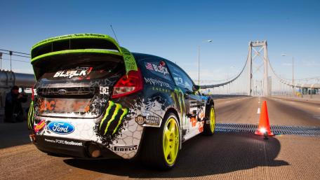 Thrilling Gymkhana Action on a Stunning Bridge View wallpaper