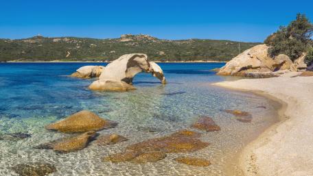 Scenic Coastal Paradise with Clear Waters and Unique Rock Formations wallpaper