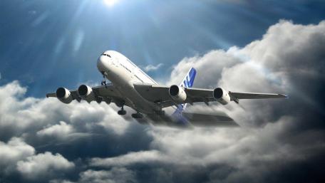 Majestic Flight Through Cloudy Skies wallpaper