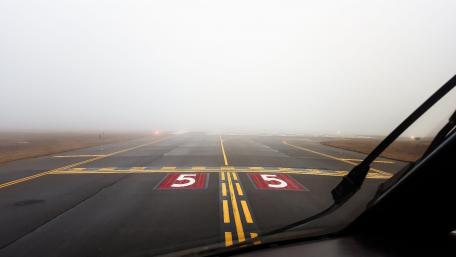 Misty Runway Ahead for Adventurous Flights wallpaper
