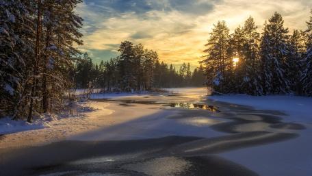 Winter Tranquility by the Frozen River wallpaper