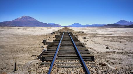 Endless Tracks under the Mountain Sky wallpaper