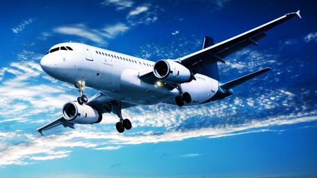 Incredible Aircraft Flying Through Blue Skies wallpaper