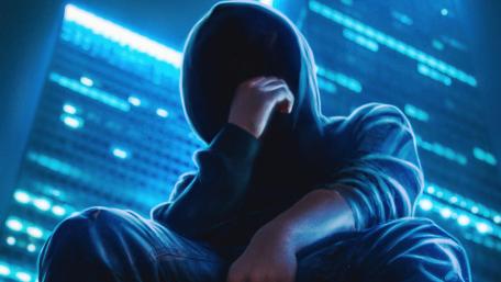 Mystic Hoodie Figure in Urban Glow wallpaper