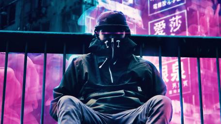 Mysterious Figure Amidst Pink Neon Haze wallpaper