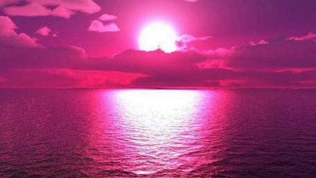 Dreamy Pink Horizon Over Tranquil Sea wallpaper