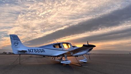Stunning Cirrus SR22 at Sunset Glow wallpaper