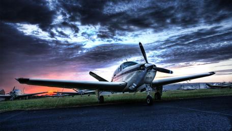 Stunning Aircraft Against a Breathtaking Sunset Sky wallpaper