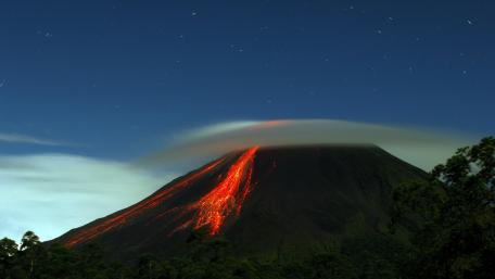 Majestic Volcano Under a Starry Sky wallpaper