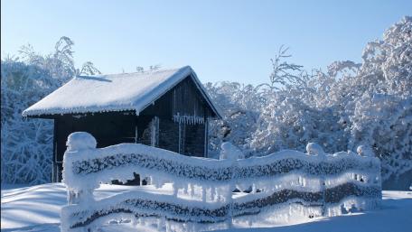 Winter Wonderland at a Cozy Cabin wallpaper