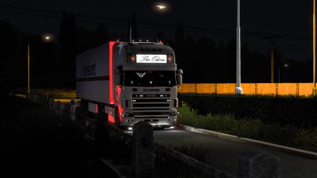 Nighttime Journey with a Truck's Glow wallpaper