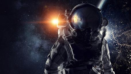Astronaut Exploring the Cosmos in Darkness wallpaper