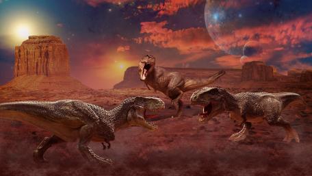 Dinosaurs Roaming an Alien Desert Landscape wallpaper