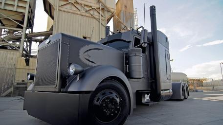 Powerful Semi-Truck at Industrial Site wallpaper