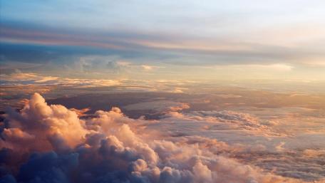 Title: Majestic Sunset over Cloud Horizon wallpaper