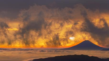Majestic Volcano at Dusk in a Dreamlike Realm wallpaper